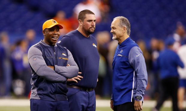 INDIANAPOLIS, IN - DECEMBER 14:  Head coach Vance Joseph of the Denver Broncos talks with head coac...