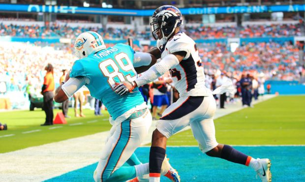 MIAMI GARDENS, FL - DECEMBER 03: Julius Thomas #89 of the Miami Dolphins makes the catch for a touc...