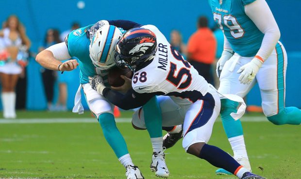 MIAMI GARDENS, FL - DECEMBER 03: Von Miller #58 of the Denver Broncos sacks Jay Cutler #6 of the Mi...