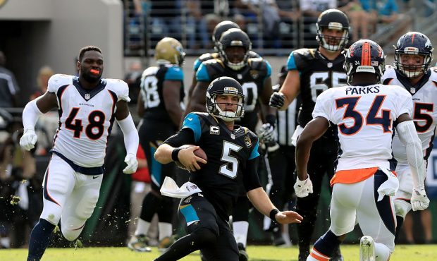 JACKSONVILLE, FL - DECEMBER 04:  Blake Bortles #5 of the Jacksonville Jaguars slides after running ...