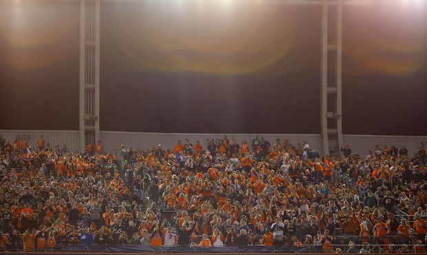 DENVER, CO - NOVEMBER 01:  A banner on the stadium reads 'Pat Bowlen 1984-present' as fans look as ...