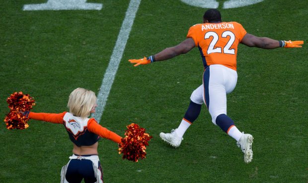 DENVER, CO - NOVEMBER 19:  Running back C.J. Anderson #22 of the Denver Broncos runs onto the field...