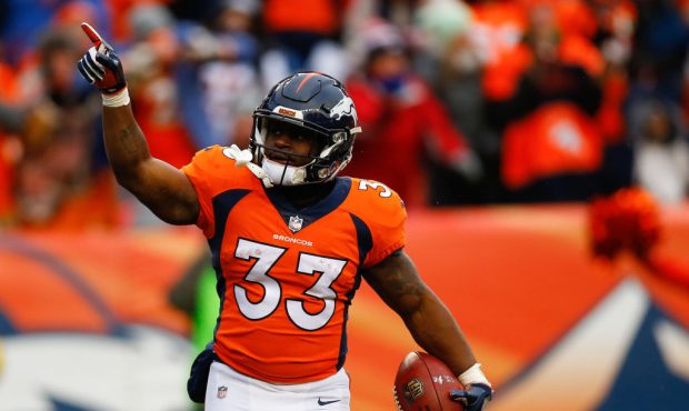 DENVER, CO - DECEMBER 31:  Running back De'Angelo Henderson #33 of the Denver Broncos celebrates hi...