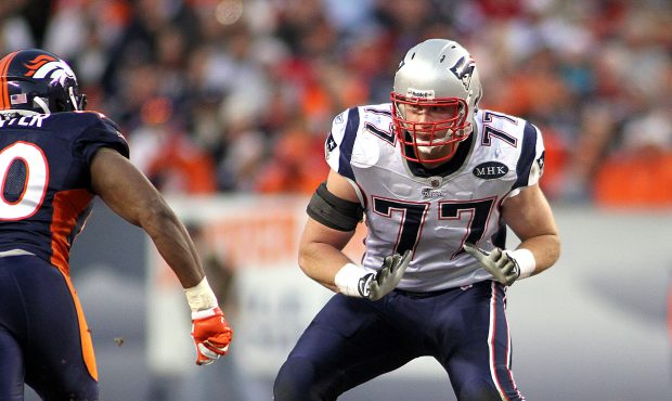 Nate Solder #77 of the New England Patriots prepares to block against the Denver Broncos on Decembe...