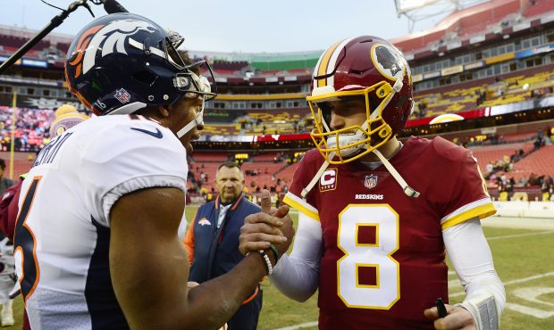 LANDOVER, MD - DECEMBER 24: Quarterback Kirk Cousins #8 of the Washington Redskins and wide receive...