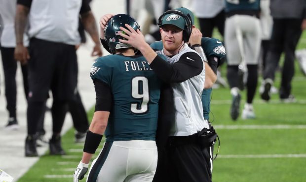 MINNEAPOLIS, MN - FEBRUARY 04:  Nick Foles #9 of the Philadelphia Eagles is congratulated by his te...