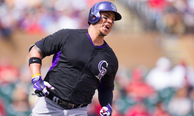 SCOTTSDALE, AZ - FEBRUARY 28: Carlos Gonzalez #5 of the Colorado Rockies runs the bases during a sp...