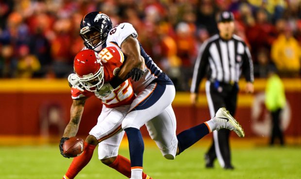 KANSAS CITY, MO - OCTOBER 30: Cornerback Marcus Peters #22 of the Kansas City Chiefs is tackled by ...
