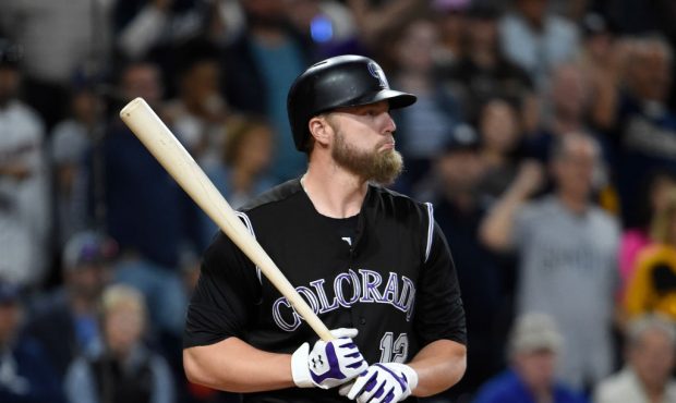 SAN DIEGO, CA - SEPTEMBER 23: Mark Reynolds #12 of the Colorado Rockies reacts after taking a strik...