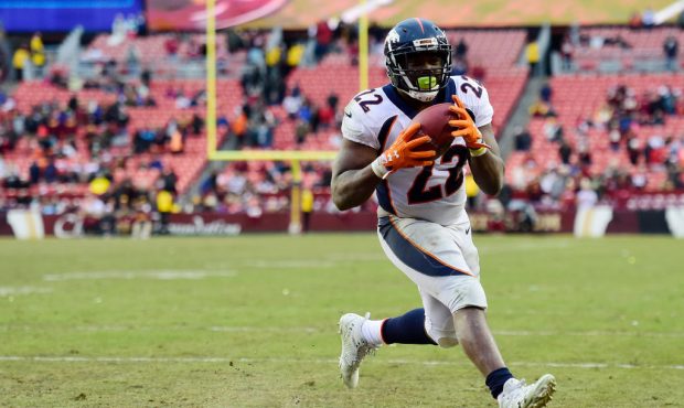LANDOVER, MD - DECEMBER 24: Running back C.J. Anderson #22 of the Denver Broncos scores a two-point...