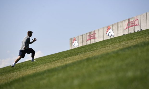Denver Broncos TE Jake Butt runs the hill during rehab on July 18, 2017 in Englewood, Colorado at D...