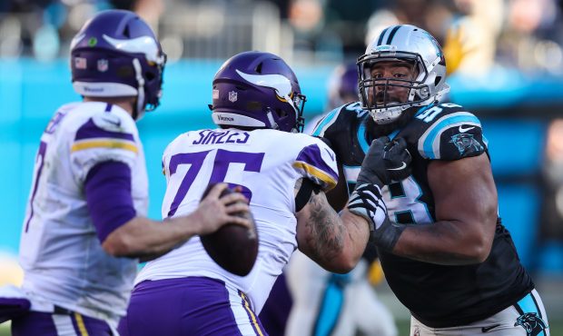 Carolina Panthers defensive tackle Star Lotulelei (98) tries to get past Minnesota Vikings tackle J...