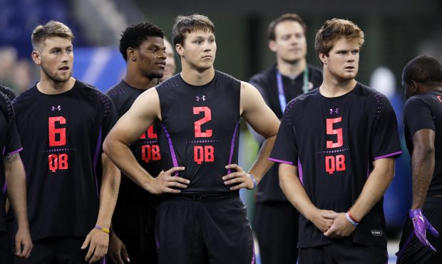 USC quarterback Sam Darnold (right) and Wyoming quarterback Josh Allen look on during the NFL Combi...
