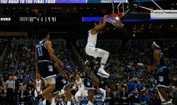 Marvin Bagley III #35 of the Duke Blue Devils dunks the ball against the Rhode Island Rams during t...