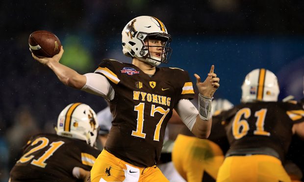 SAN DIEGO, CA - DECEMBER 21:  Josh Allen #17 of the Wyoming Cowboys passes the ball during the firs...
