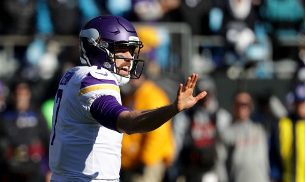 CHARLOTTE, NC - DECEMBER 10:  Case Keenum #7 of the Minnesota Vikings makes a call at the line agai...