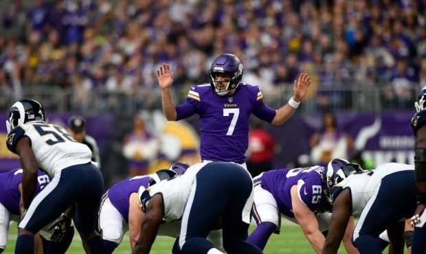 MINNEAPOLIS, MN - NOVEMBER 19: Case Keenum #7 of the Minnesota Vikings calls a play at the line of ...