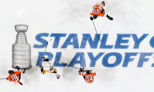 Brandon Manning #23, Oskar Lindblom #54 and Nolan Patrick #19 of the Philadelphia Flyers skate acro...