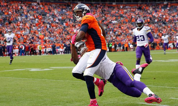 DENVER, CO - OCTOBER 04:  Wide receiver Emmanuel Sanders #10 of the Denver Broncos makes a pass rec...