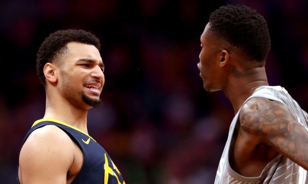 DENVER, CO - APRIL 05:  Jamal Murray #27 of the Denver Nuggets exchanges words with Jamal Crawford ...