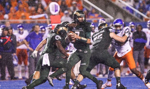 Quarterback Nick Stevens No. 7 of the Colorado State Rams looks for an open receiver during first h...
