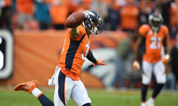 Justin Simmons (31) of the Denver Broncos celebrates an interception in the fourth quarter of the g...
