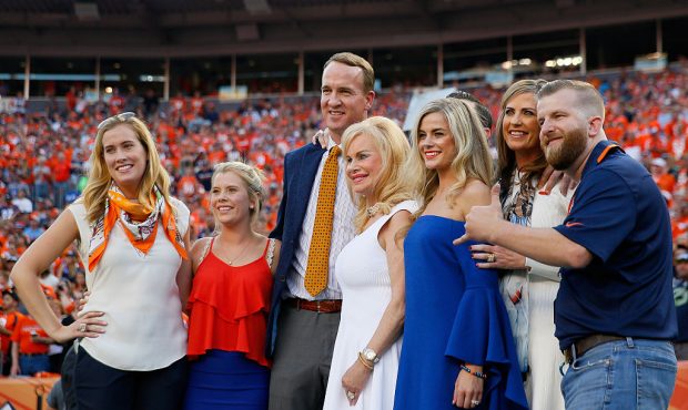 DENVER, CO - SEPTEMBER 08:  Peyton Manning poses with Annabel Bowlen and other members of the Bowle...