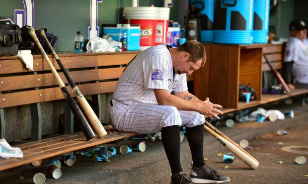 DENVER, CO - JUNE 02: Bryan Shaw #29 of the Colorado Rockies hangs his head in the dugout after bei...