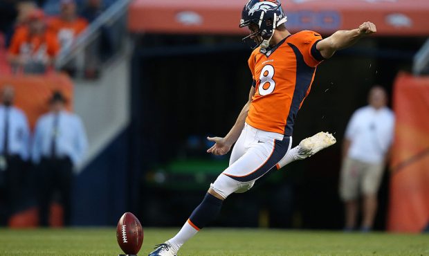 Brandon McManus of the Denver Broncos takes the opening kick off against the Arizona Cardinals duri...