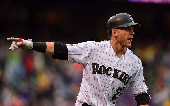 Trevor Story (27) of the Colorado Rockies runs the bases after hitting a ninth-inning, walk-off hom...