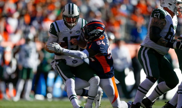 DENVER, CO - DECEMBER 10:  Inside linebacker Brandon Marshall #54 of the Denver Broncos sacks quart...