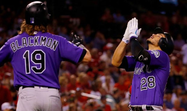 ST. LOUIS, MO - JULY 30:  Nolan Arenado #28 of the Colorado Rockies celebrates after hitting a gran...