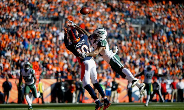 DENVER, CO - DECEMBER 10:  Cornerback Buster Skrine #41 of the New York Jets defends a pass away fr...