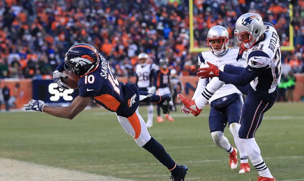 DENVER, CO - DECEMBER 18:  Wide receiver Emmanuel Sanders #10 of the Denver Broncos nearly has a re...