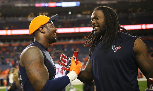 DENVER, CO - OCTOBER 24:  Outside linebacker Von Miller #58 of the Denver Broncos shakes hands with...