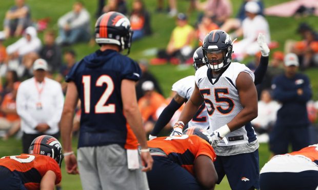 Linebacker Bradley Chubb #55 has eyes on quarterback Paxton Lynch #12 on day 2 of Denver Broncos tr...