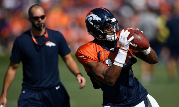 Denver Broncos wide receiver Courtland Sutton (14) catches a pass during a drill at training camp a...