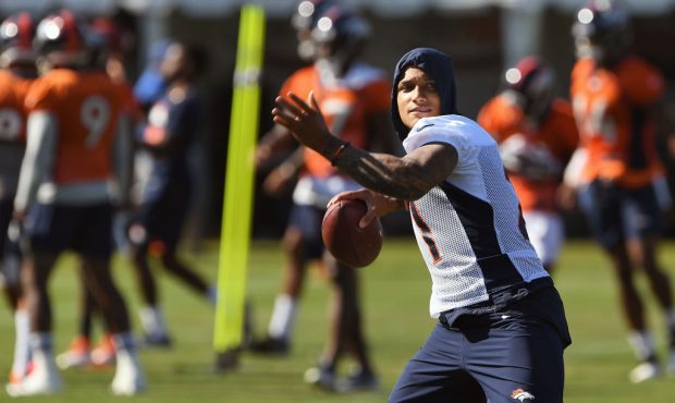 Defensive back Su'a Cravens #21 warming up before practice at Denver Broncos training camp at the U...