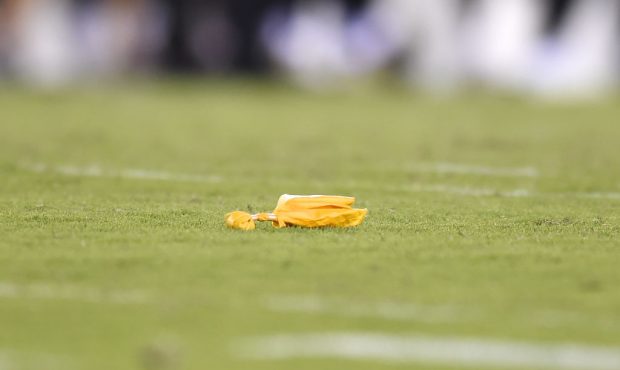 A penalty flag sits on the field during a NFL preseason game between the Philadelphia Eagles and th...