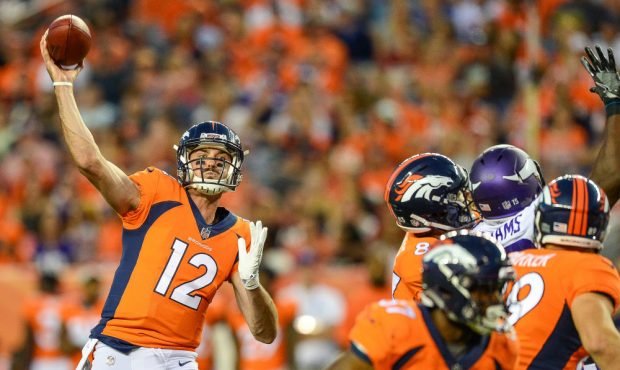 Denver Broncos quarterback Paxton Lynch (12) passes against the Minnesota Vikings during an NFL pre...