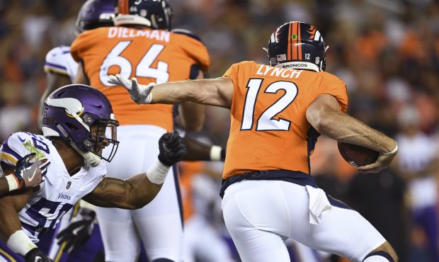 Paxton Lynch #12 breaks down the field as the Denver Broncos take on the Minnesota Vikings during t...