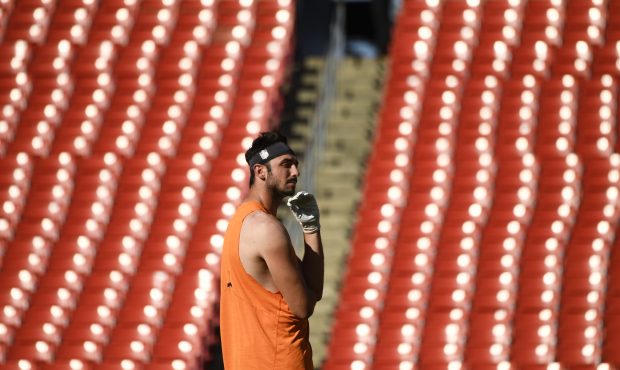 Quarterback Paxton Lynch #12 of the Denver Broncos during warmups before they take on the Washingto...
