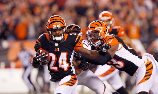 Cincinnati Bengals cornerback Adam Jones runs with the ball during a kickoff return in the third qu...