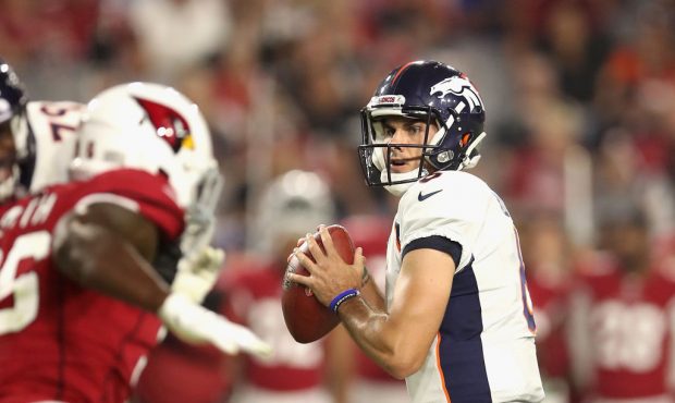 GLENDALE, AZ - AUGUST 30:  Quarterback Chad Kelly #6 of the Denver Broncos drops back to pass durin...