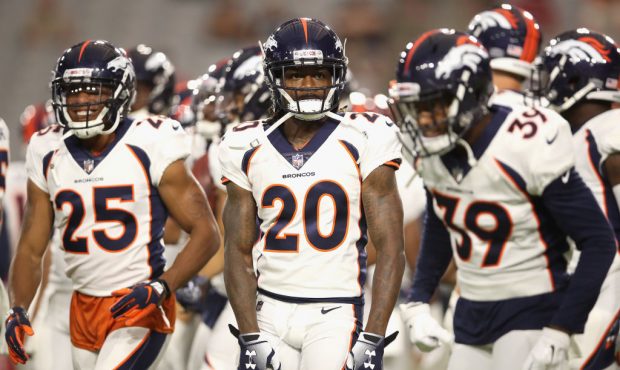 GLENDALE, AZ - AUGUST 30:  Defensive back Adam Jones #20 of the Denver Broncos warms up before the ...