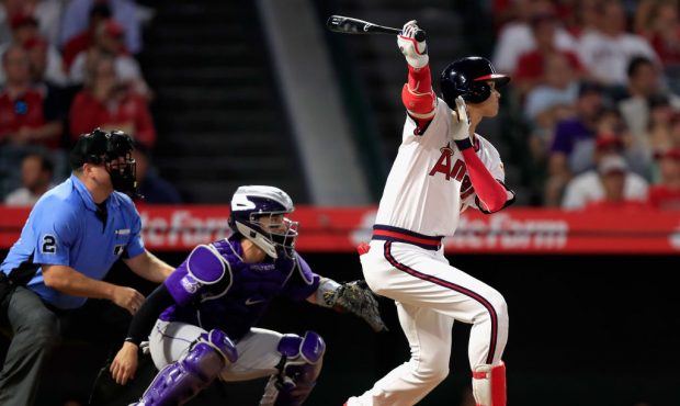 ANAHEIM, CA - AUGUST 27:  Shohei Ohtani #17 of the Los Angeles Angels of Anaheim flys out as Tony W...