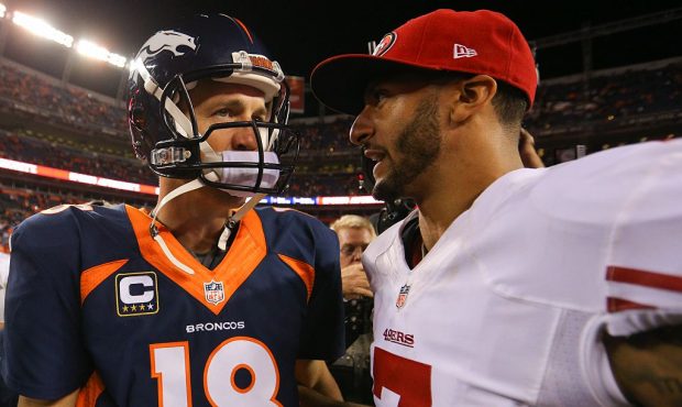 DENVER, CO - OCTOBER 19:  Quarterback Peyton Manning #18 of the Denver Broncos and quarterback Coli...