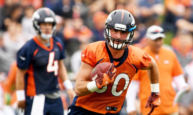 Tight end Jake Butt #80 turns up field after a catch on day 2 of Denver Broncos training camp at th...