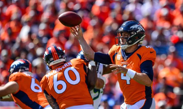 Quarterback Case Keenum #4 of the Denver Broncos passes against the Seattle Seahawks int he first q...