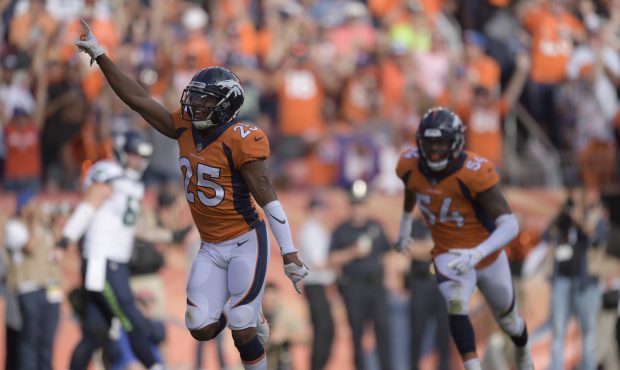 Denver Broncos defensive back Chris Harris (25) celebrates a sack during the fourth quarter on Sund...
